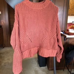 Rust colored chunky knit slightly cropped sweater